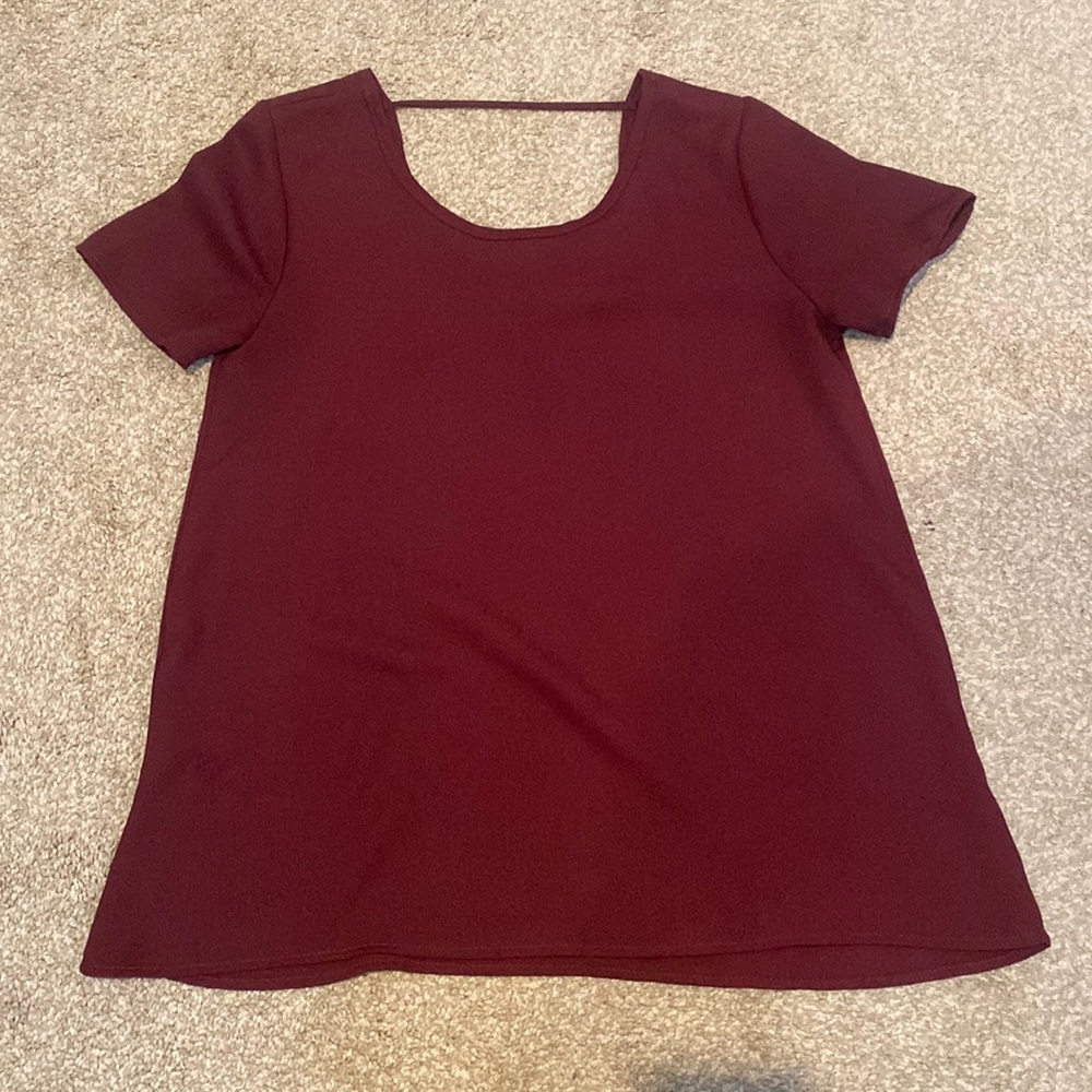Burgundy top, could fit size small or medium